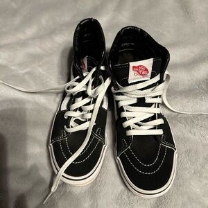 Vans hightops, women’s size 6 1/2 or men’s size 4 1/2